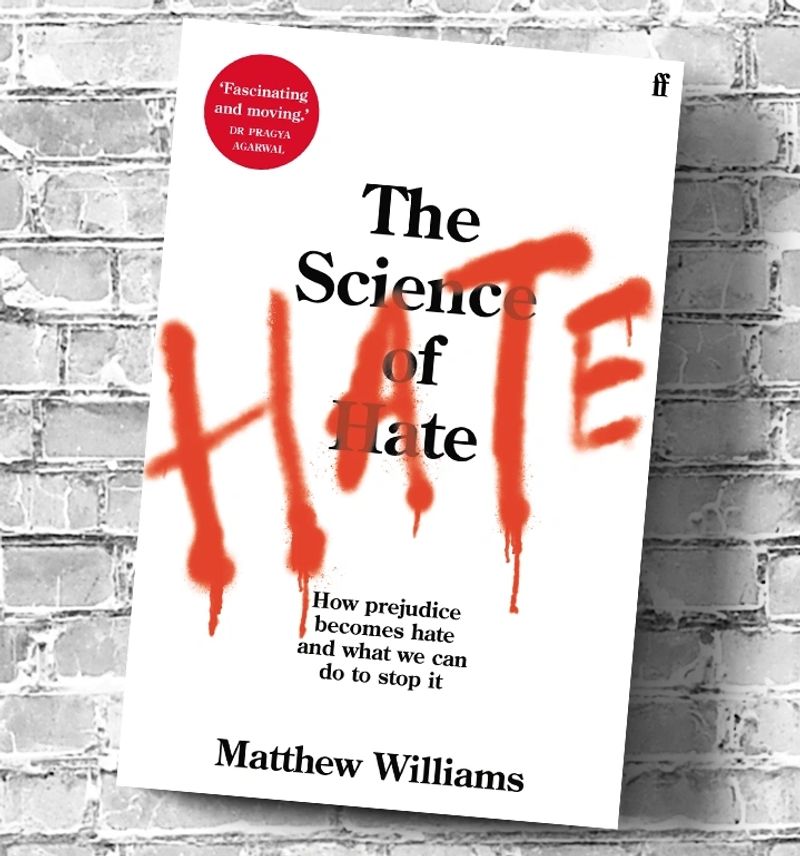 Hate lab book on black and white bricked wall background